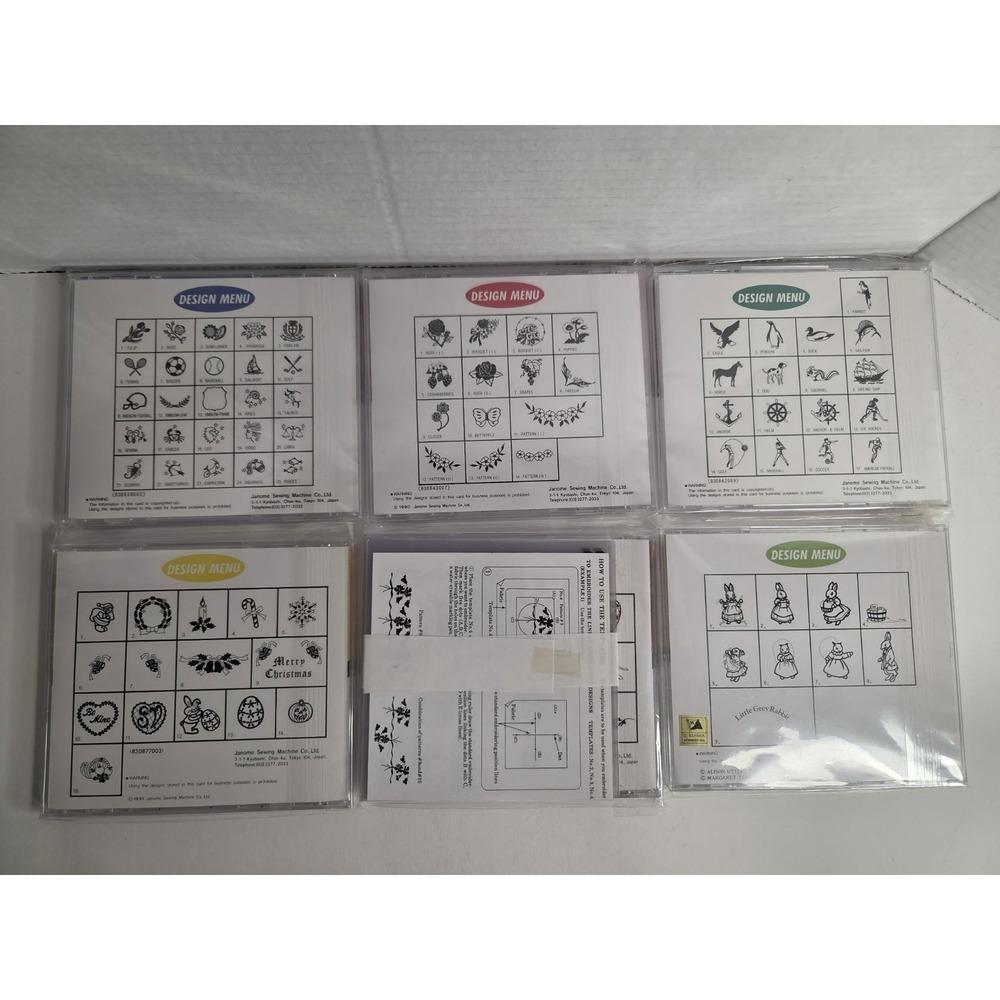 Janome Memory Card Lot Of 6 Design Memory Cards Sewing Machine Embroidery NIP - Picture 2 of 2